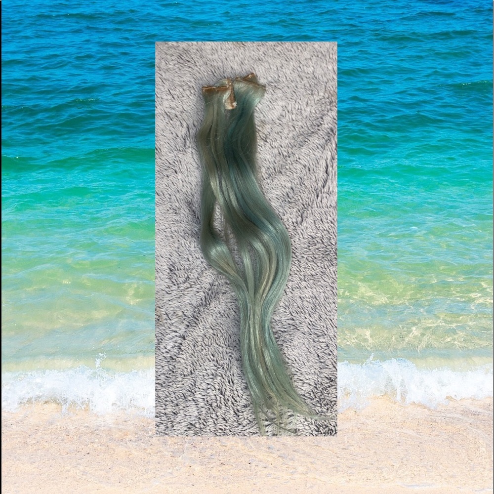 Mint green hair extensions